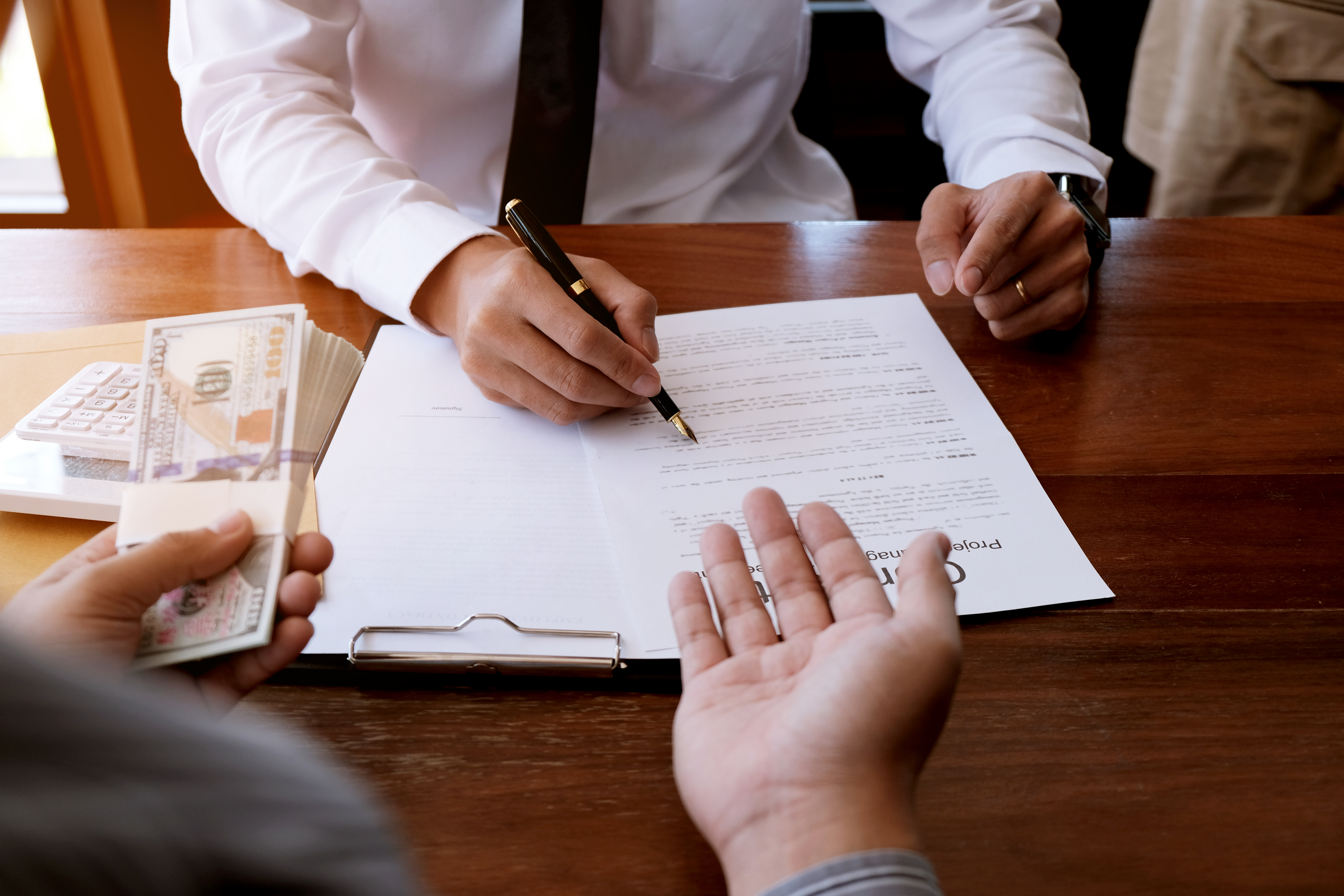 Business people signing contract making a deal with real estate agent Concept for consultant and home insurance concept